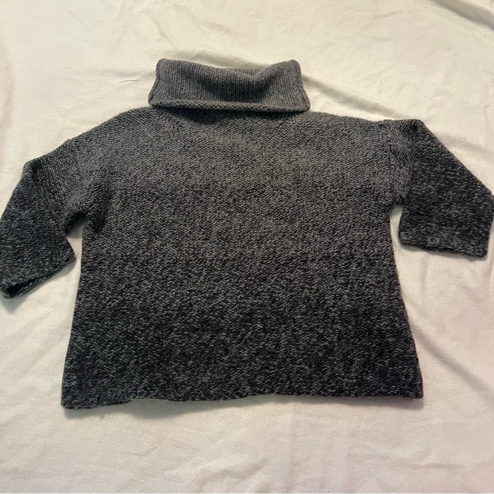 Cropped lamb wool grey elbow length turtle neck sweater. Size small.